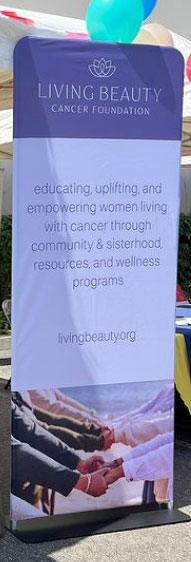 White and purple banner stand.